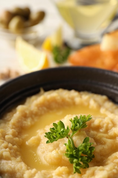 Foto concepto de comida sabrosa con hummus de cerca