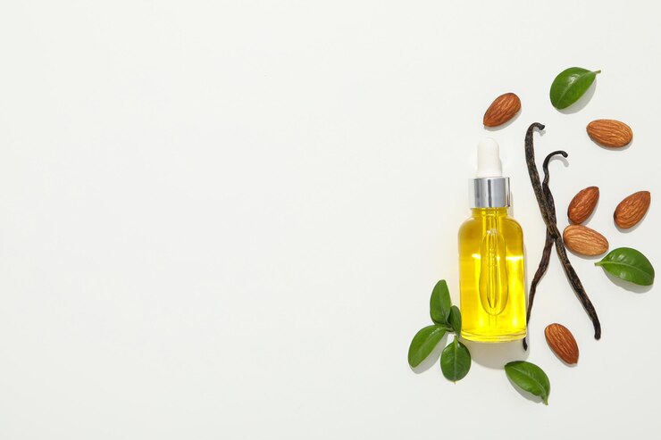 El concepto de cuidado de la piel y del cuerpo almendras aceite de almendras