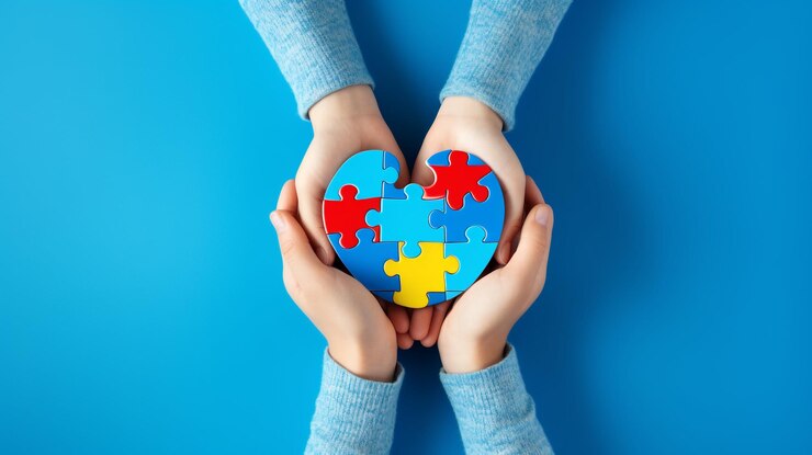 Concepto del día mundial de concientización sobre el autismo Manos de adultos y niños sosteniendo corazón de rompecabezas AI Generativo