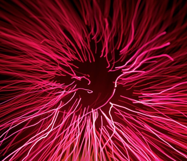 Foto concepto de efecto de luz de fibra óptica rosa patrón de anémona de mar magenta luminiscente primer plano de globo de plasma eléctrico de neón brillante ilustración digital futurista de transferencia de datos mediante fluorescencia