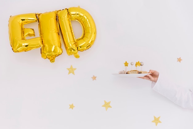 Foto concepto de eid al-fitr con letras