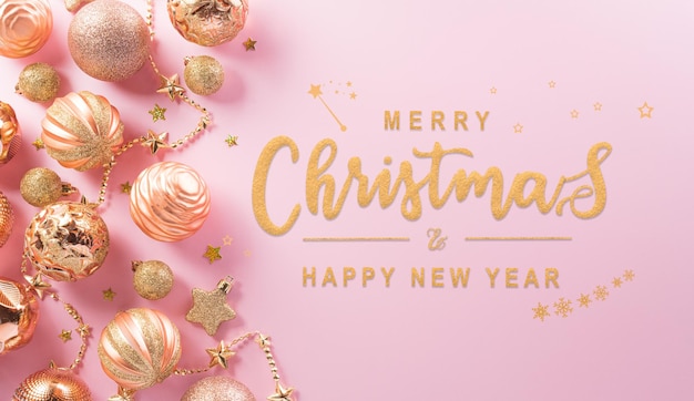 Concepto de fondo de Navidad y Año Nuevo Vista superior de la estrella de la pelota de Navidad y el copo de nieve sobre un fondo rosa pastel