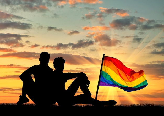 El concepto de gays. Silueta de un par de turistas gay en la naturaleza y la bandera del arco iris