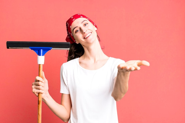 Concepto de lavadora de ventanas de mujer bonita joven