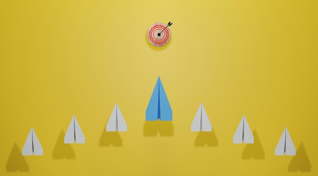 Concepto de liderazgo con avión de papel azul que lidera entre el blanco sobre fondo amarillo