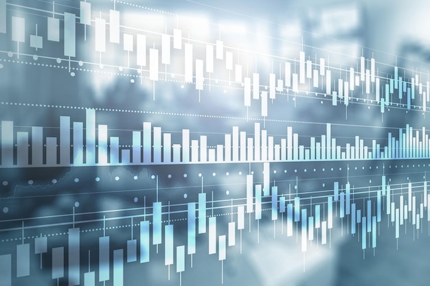 Concepto de negocio con gráfico de velas de comercio de inversión bursátil y fondo de oficina borroso