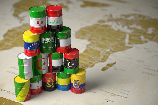 Concepto de OPEP Barriles de petróleo en color de banderas de países miembros de la OPEP en el fondo del mapa político mundial
