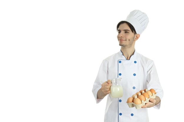 Concepto de profesión joven chef masculino atractivo aislado sobre fondo blanco