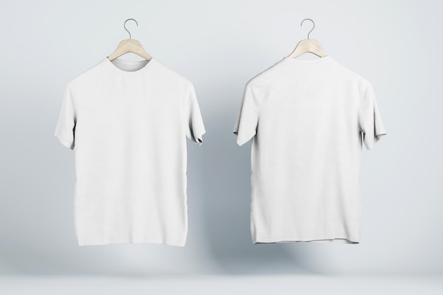 Concepto de publicidad con dos camisetas blancas en blanco en perchas de madera con espacio de copia para su texto sobre fondo claro abstracto maqueta de renderizado 3D
