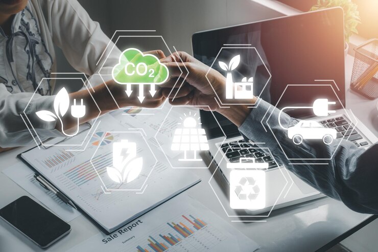 Concepto de reducción de emisiones de CO2 Equipo de negocios haciendo un gesto de "high fives" mientras se ríen con el icono de CO2 de la pantalla VR Desarrollo sostenible y negocios verdes basados en energía renovable transporte eléctricox9