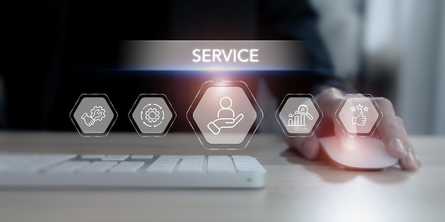Concepto de servicio Una escena profesional con una persona usando un ratón de computadora con iconos de servicio holográficos que simbolizan el soporte técnico y la satisfacción del servicio al cliente del proveedor de servicios