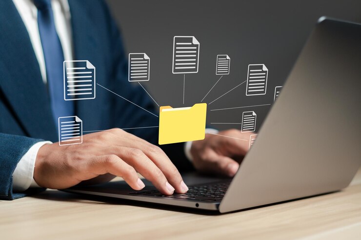 Foto concepto de tecnología de sistema de gestión de documentos empresario que utiliza una computadora portátil con base de datos en la computadora para almacenar archivos datos de documentos proceso de almacenamiento de archivos digitales con seguridad y tecnología de la información