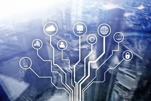 Concepto de telecomunicaciones e IOT en el fondo borroso del centro de negocios