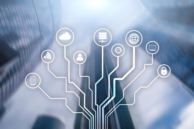 Concepto de telecomunicaciones e IOT en el fondo borroso del centro de negocios