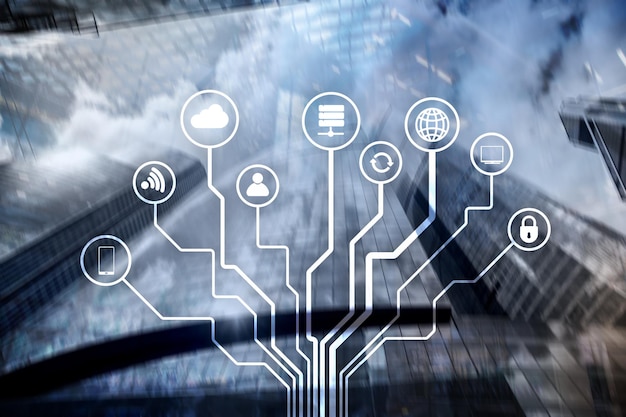 Concepto de telecomunicaciones e IOT en el fondo borroso del centro de negocios