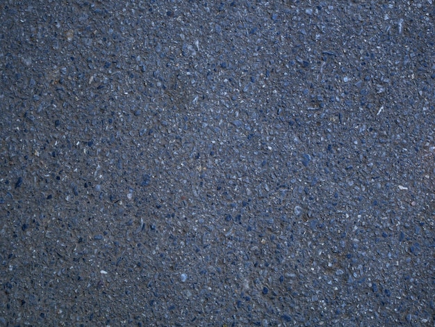 Concreto de pedra preta do fundo da textura da estrada asfaltada
