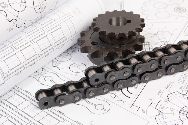 Conduzindo corrente de rolos industriais e roda dentada em desenhos de engenharia de impressão
