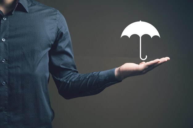 Ícone de guarda-chuva homem segurando na mão