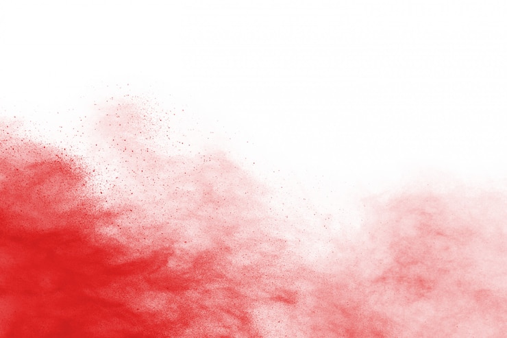 Foto congele o movimento de uma explosão de pó vermelho, isolado no fundo branco.