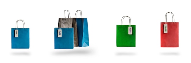 Conjunto de bolsas de compras multicolores sobre un fondo blanco aislado paquetes de venta y descuentos fl ...