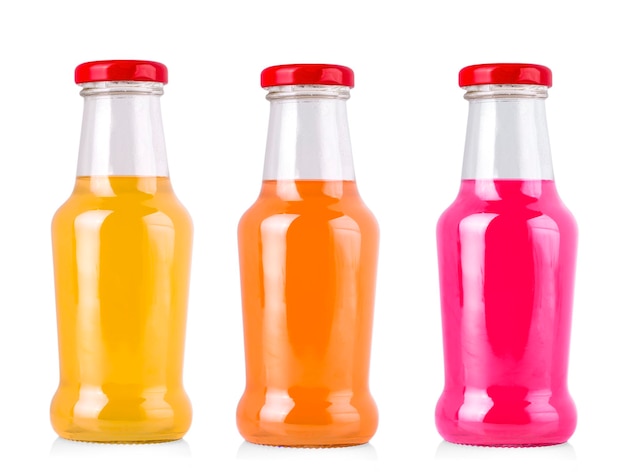 Foto conjunto de botellas de jugo de naranja y rojo aisladas sobre un fondo blanco con un camino de recorte estilo de vida saludable