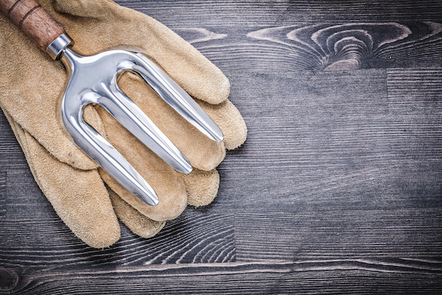 Conjunto de concepto de agricultura de guantes de seguridad de cuero de horquilla de paleta