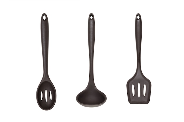 Conjunto de acessórios de cozinha de silicone de três itens isolados em uma superfície branca