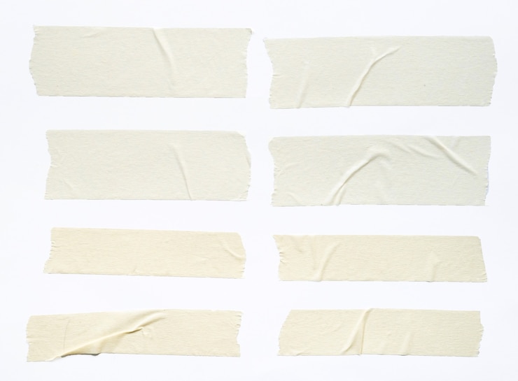 Foto conjunto de fita adesiva branca isolado em fundo branco