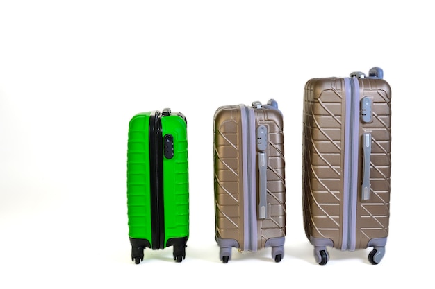 Conjunto de malas cinza e verdes para viajar