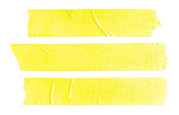Foto conjunto de três adesivos de fita de papel amarelo em branco isolados em fundo branco