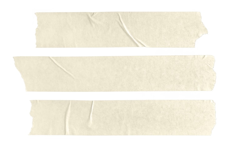 Foto conjunto de três adesivos de fita de papel em branco bege isolados em fundo branco modelo
