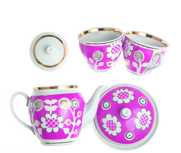 Conjunto de xícaras de cerâmica retrô com padrões, bules, açucareiro isolado