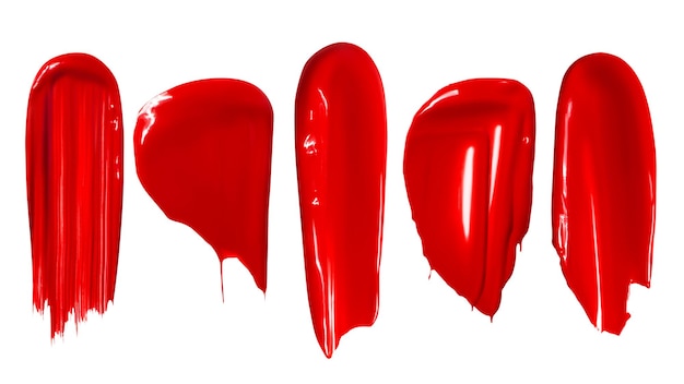 Conjunto de diferentes trazos de lápiz labial brillo de labios pintura colores rojos aislado sobre un fondo blanco