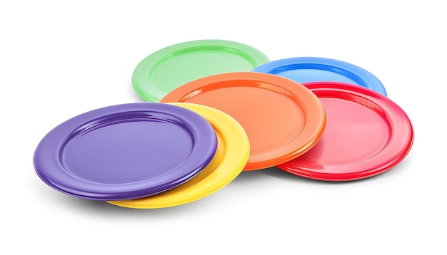 Foto conjunto de frisbees coloridos sobre un fondo blanco