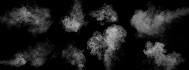 Un conjunto de ocho tipos diferentes de vapor de humo retorcido aislado en un fondo negro para superponer en tus fotos Fantasma de humo en forma de corazón Vapor horizontal y vertical