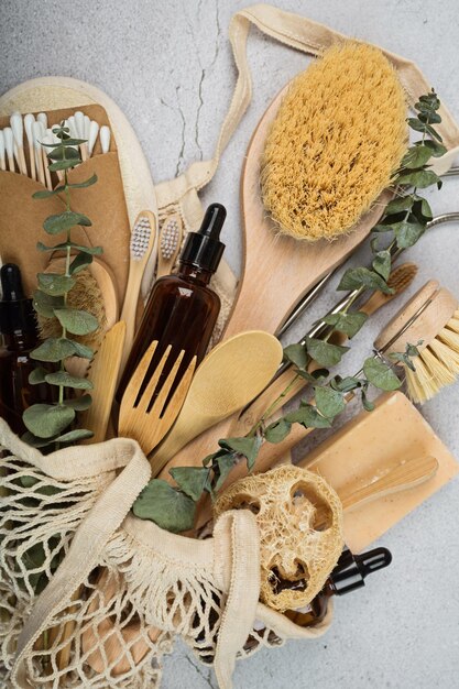 Foto conjunto de productos ecológicos sobre fondo de hormigón gris estilo de vida sostenible sin plástico