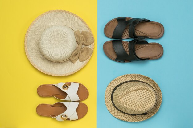 Un conjunto de zapatos y gorros de verano para hombre y mujer. El concepto de unas vacaciones familiares de verano.