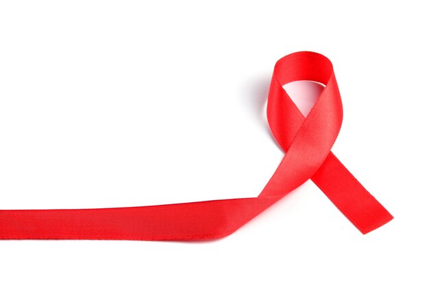 Foto conscientização sobre a sida fita vermelha sobre fundo branco