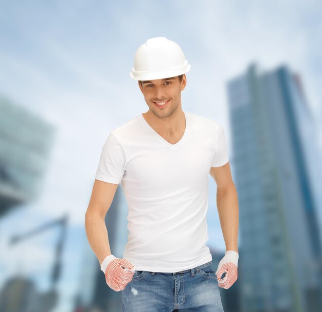 Foto construção, desenvolvimento, construção, conceito de arquitetura - belo construtor de capacete branco