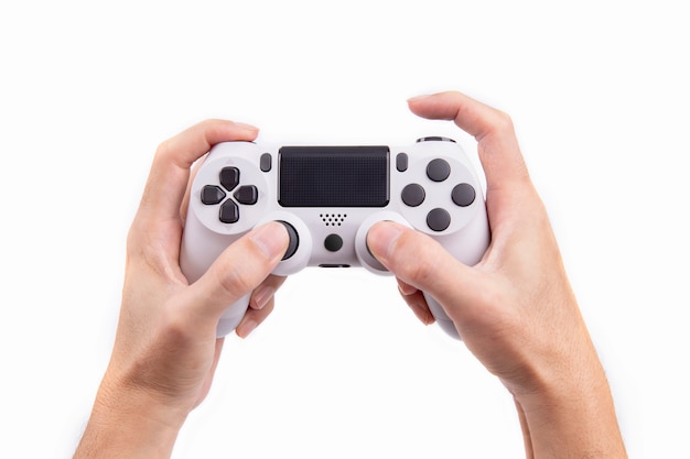 Controlador de jogos de joystick na mão isolado no fundo branco