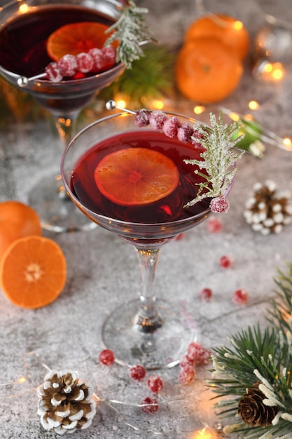 Copa con margarita de arándanos con arándanos confitados romero y mandarina Fiesta de Navidad