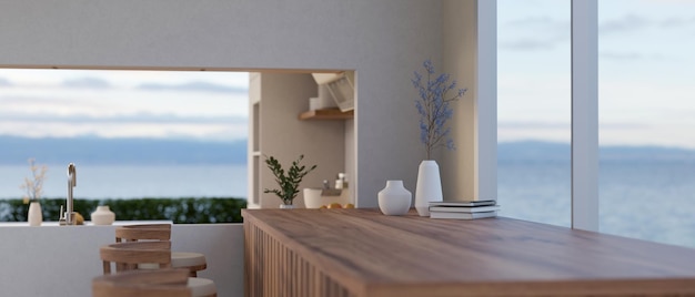 Copie el espacio en una mesa de madera contra la ventana en una cocina moderna y contemporánea
