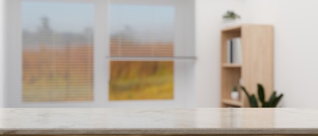 Copie el espacio en la mesa sobre la sala de estar de la casa borrosa con vista al paisaje a través de la ventana