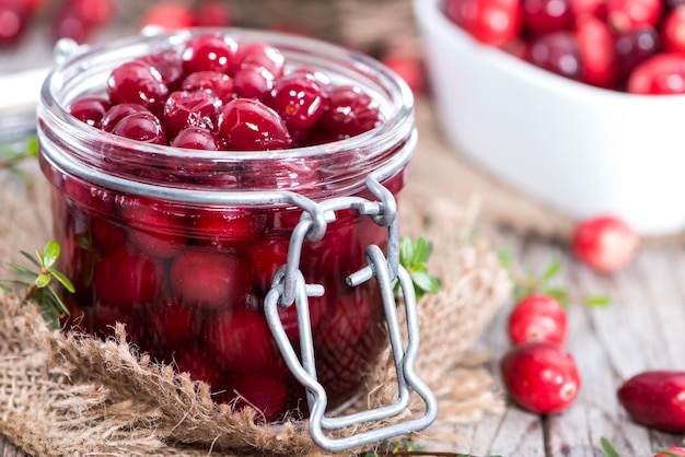 Copo com cranberries em conserva