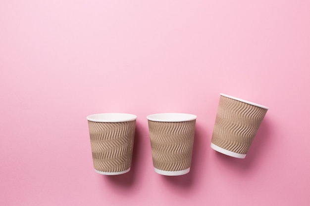 Foto copo de papel para café quente ou chá rosa