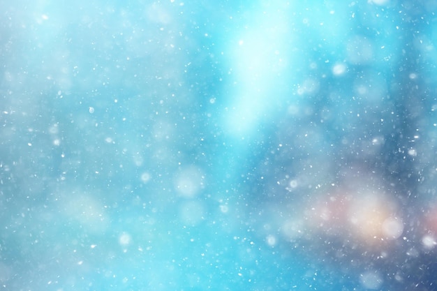 copos de nieve de nieve de fondo azul abstracto, año nuevo, diseño resplandor