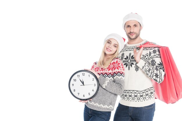 Foto coppel usar suéteres de navidad y llevar un reloj esperando el día de navidad