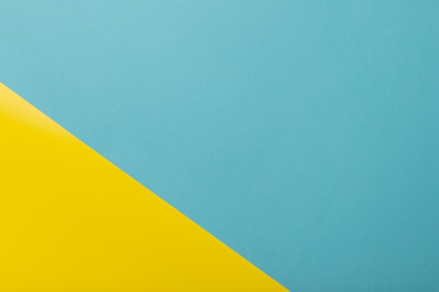 Cor de papel azul e amarelo pastel para o fundo