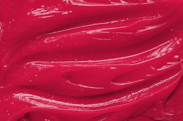 Cor do ano 2023 Viva magenta Textura de gel vermelho Mancha de creme líquido transparente cosmético Amostra de produto para cuidados com a pele closeup Pasta de dente ou cera