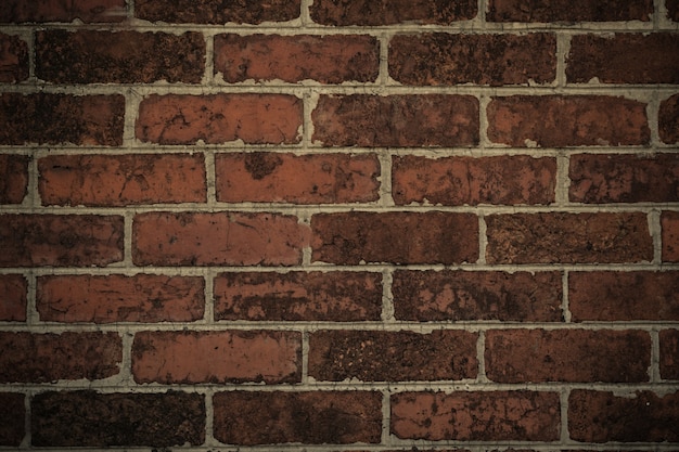 Foto cor natural da superfície do fundo da textura da parede de tijolo vermelho, processo no estilo do vintage